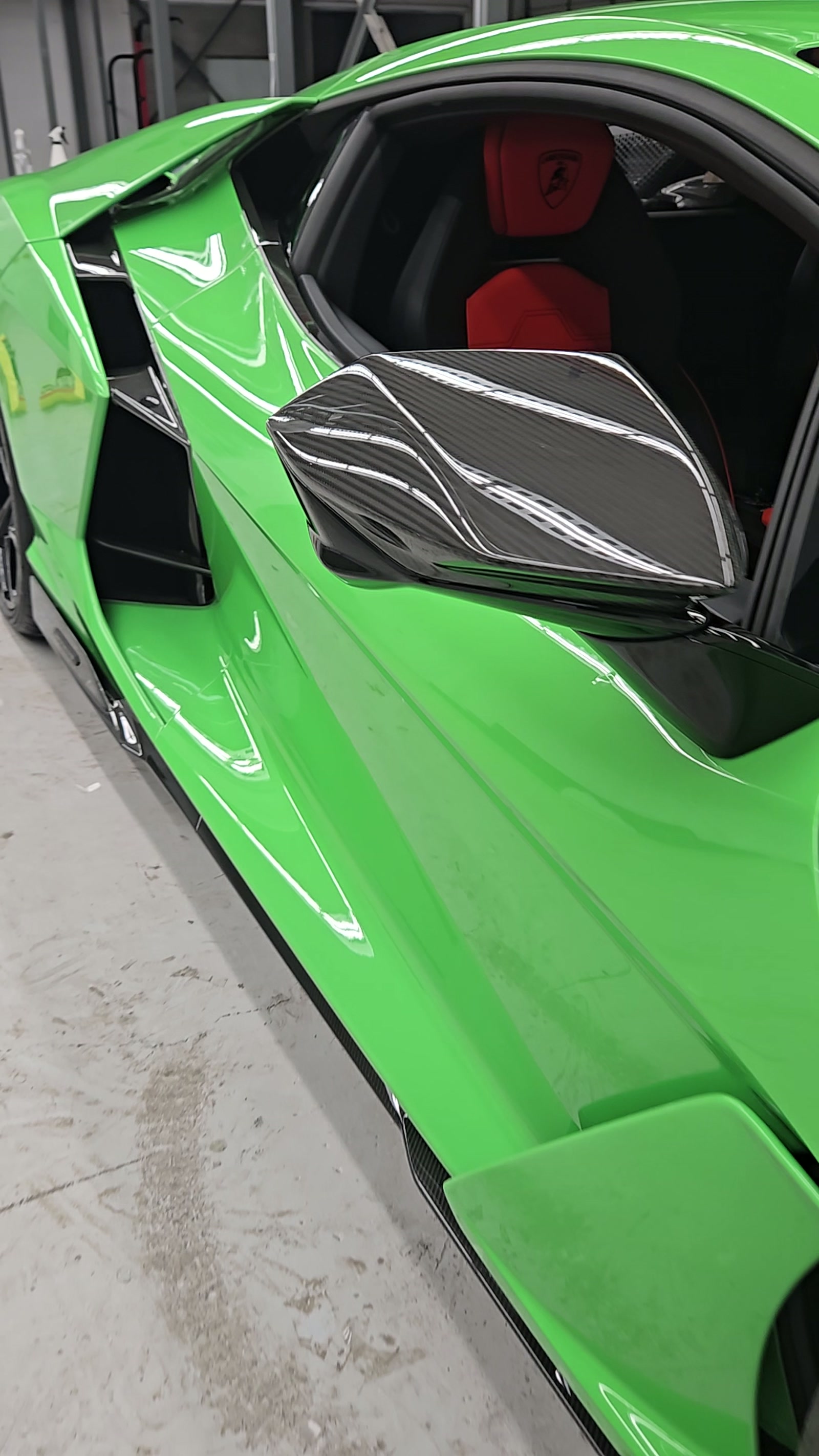 Gloss green panel detail on a Lamborghini protected with PPF